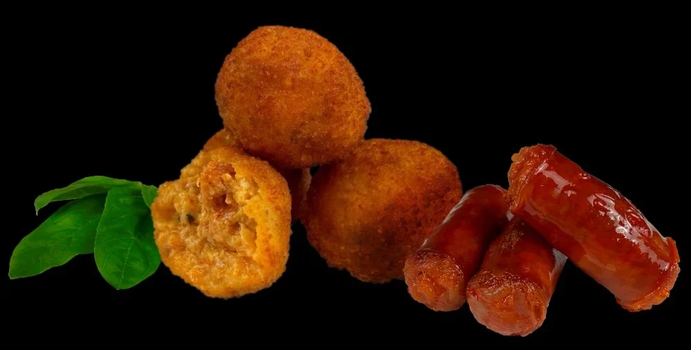 Presentación de croquetas sabor chistorra y albahaca.